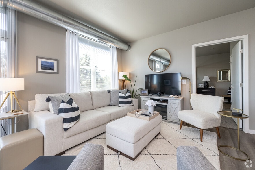 2BR, 2BA - 1,018SF - Living Room - Mill on Main