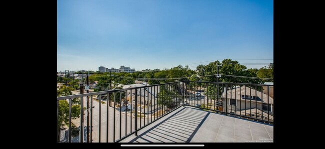 Balcony view looking Southwest. Also has view to Southeast where New Years fireworks can be seven! - 1817 N Saint Marys St