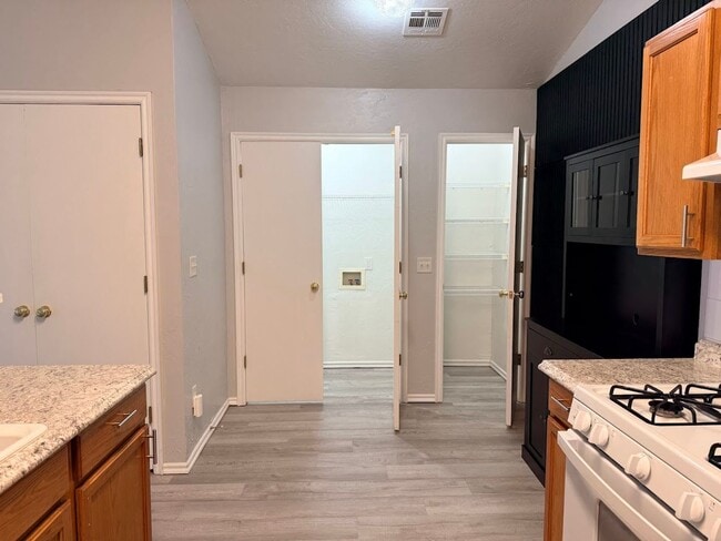 Building Photo - 4 Bedroom - 2 bath duplex located near campus and State Highway 9