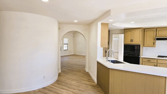 Building Photo - "Spacious, Sunlit Home in a Peaceful Ranch...