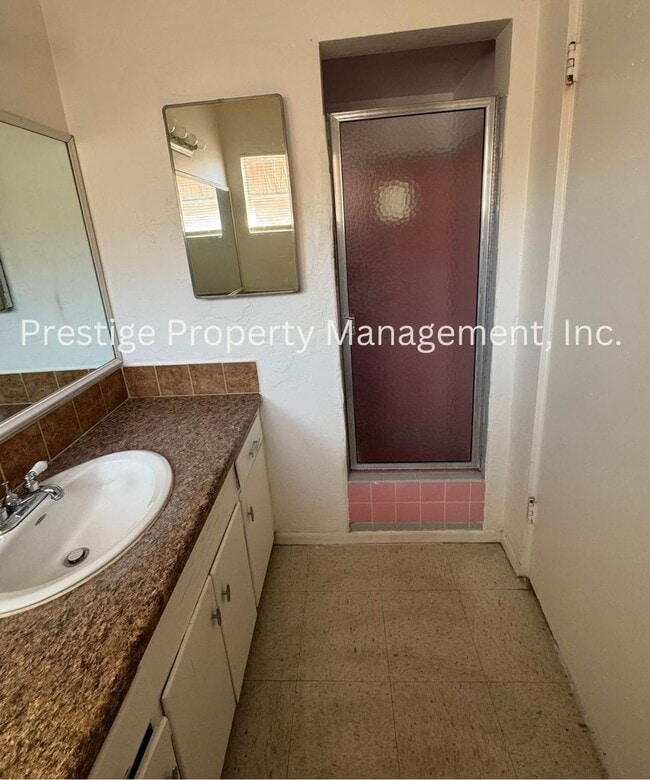 Building Photo - Stop Your Search! This 3/2+ Bonus Room is Centrally Located with a Pool and More!