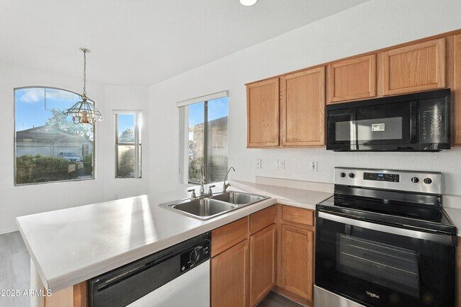 Building Photo - 8815 N 66th Ave