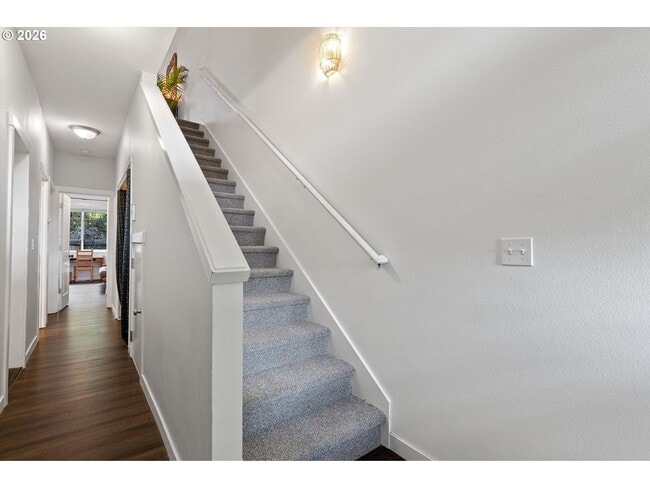 Building Photo - Spacious 3 Bedroom Townhome with Stainless Steel Appliances, Attached Garage & Open Layout