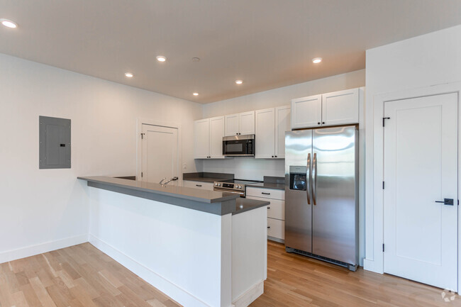 Unit 401 kitchen. - The Residence at 581 Salem St