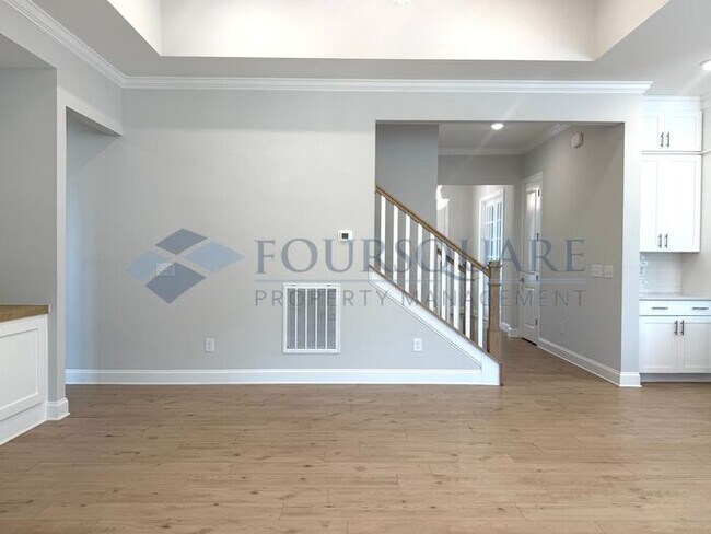 Building Photo - Elegant 4-Bed / 3.5-Bath Home with Main-Level Primary Suite, Quartz Kitchen & 3-Car Garage – In H...