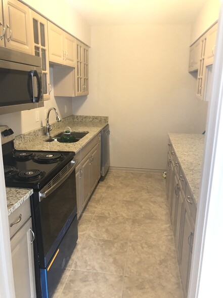 Kitchen with granite counter tops - 4320 Holland Ave