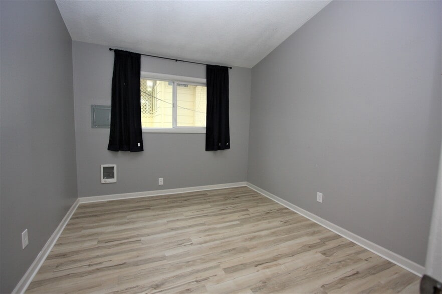 Large bedroom with huge closet (closet has storage up to top of ceiling). - 5442 -5448 SE Franklin St
