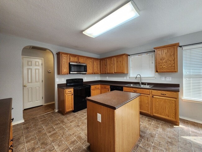 Building Photo - No Carpet / Storage Shed / Back Patio  /  ...