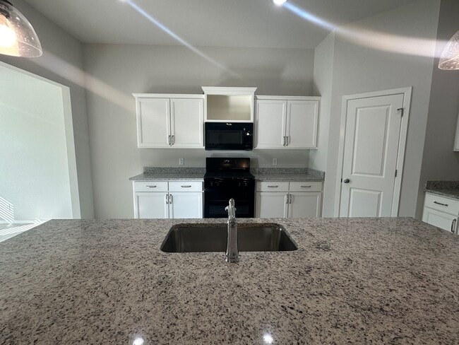 Building Photo - New - 4 bedroom in Bixby - Gated Community