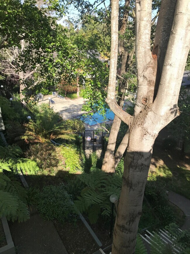 Building Photo - MOVE-IN READY! Peaceful 1-Bedroom Top Floo...