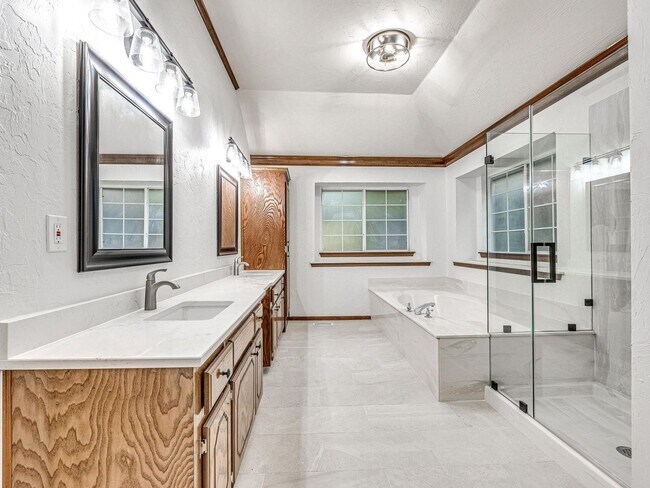 Building Photo - 4 Bedrooms - 3 Bathrooms - 3 Car Garage - ...