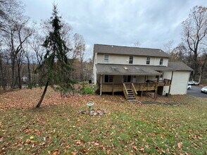 Building Photo - 4-Bedroom Retreat with Breezeway & Detached Garage on High Knob Road!"