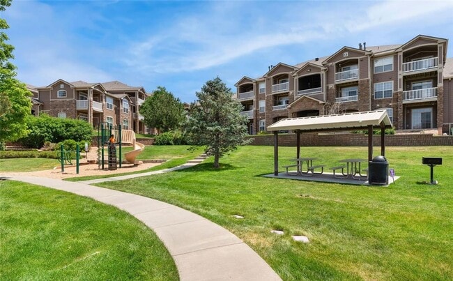 Building Photo - Bright 2-Bedroom Condo with Private Patio & Resort-Style Amenities!