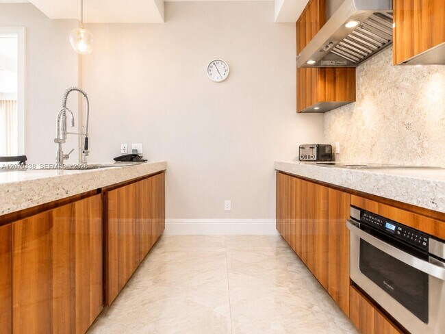 Building Photo - 9705 Collins Ave
