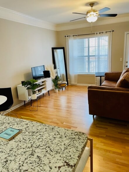 Living Room with balcony off of it - 2700 Pine Tree Rd NE
