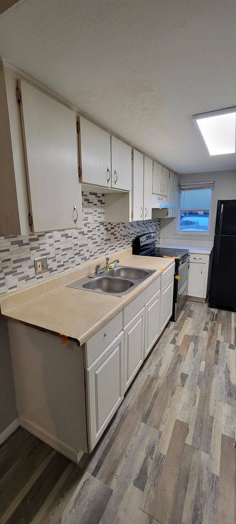 Building Photo - 2 BEDROOM 1 BATH DUPLEX CLOSE TO USF AND BUSCH GARDENS