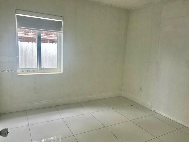 Building Photo - 6550 W 8th Ave