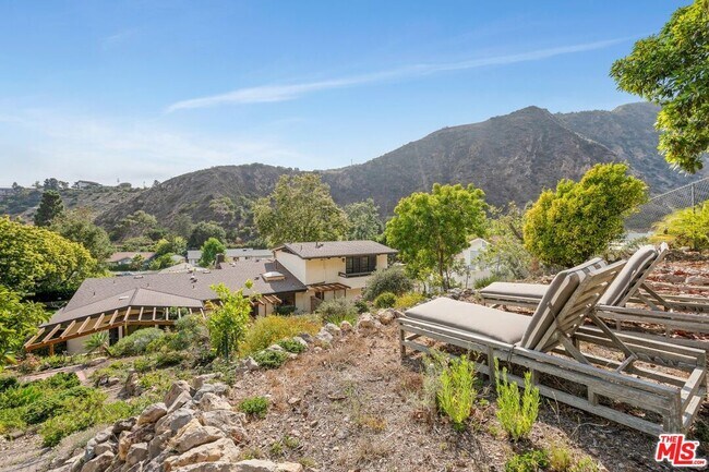 Building Photo - 5942 Paseo Cyn Dr