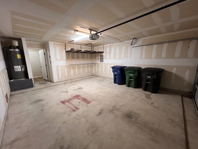 Building Photo - Generous Outdoor Space & Lawn Care Included!