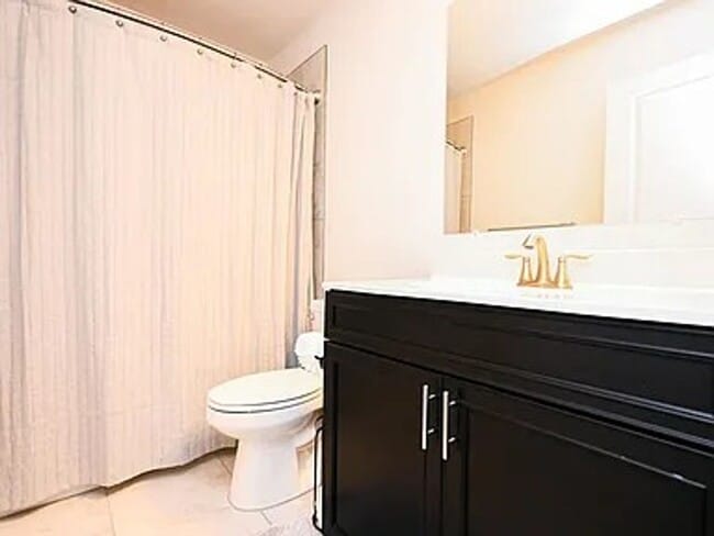 Building Photo - Stunning 3-Story Brick-Front Townhome | Modern Living + Military & First Responder Discount