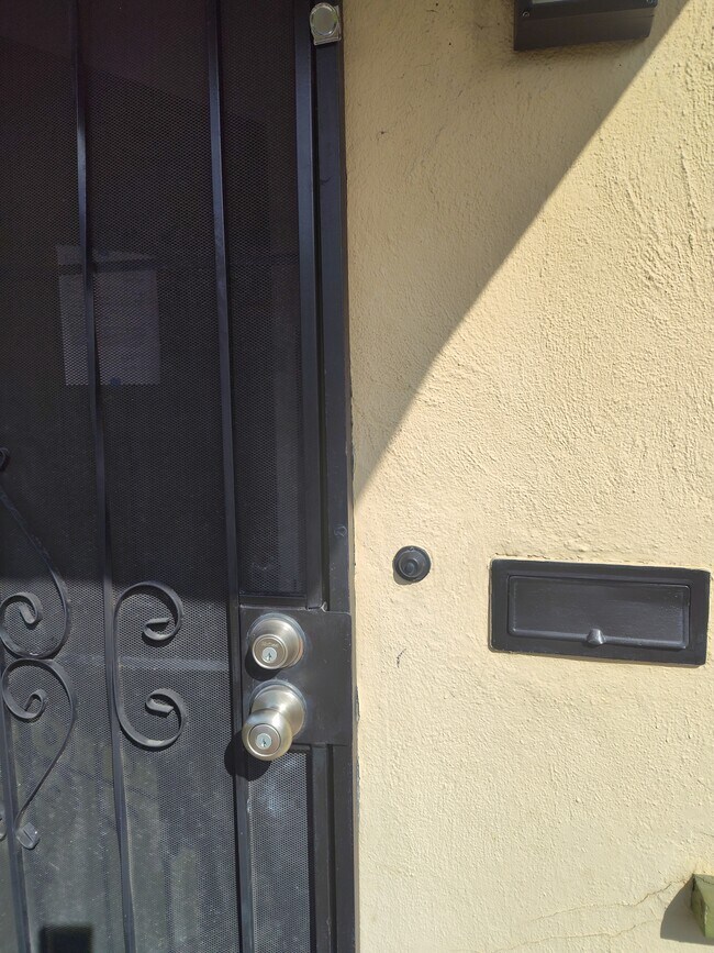 Security screen door, mail slot - 4078 43rd St