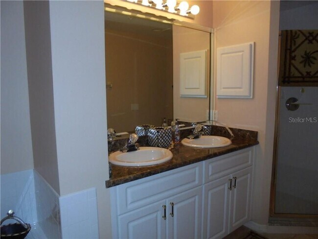 Building Photo - FOUNTAIN COURT CONDOMINIUM AVAILABLE FOR 2026 SEASON-HEART OF PUNTA GORDA