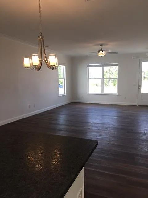 Building Photo - Sign a 12-month lease now and receive the ...