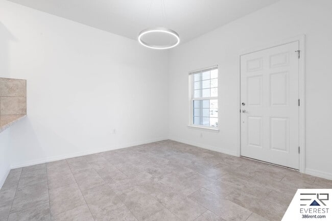 Building Photo - Modern 3-Bed, 2-Bath Townhome with Private Yard & 2-Car Garage