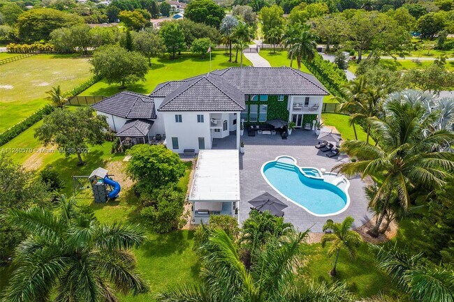 Building Photo - 5801 Melaleuca Rd