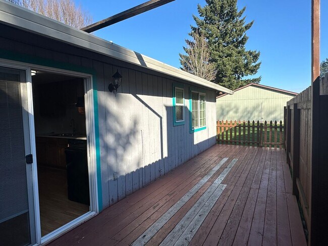 Building Photo - Spacious & Stylish 3BD Home with Iconic Stone Fireplace + Soaking Tub