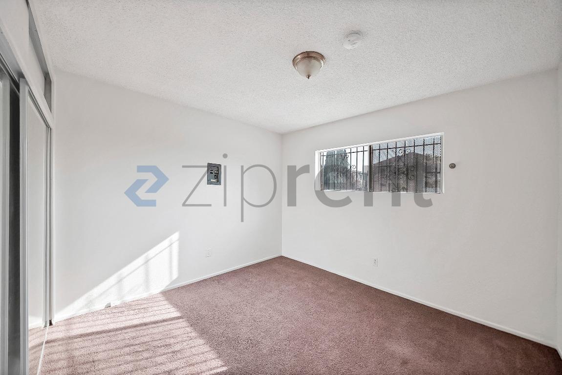 Building Photo - 2458 Normandie Ave