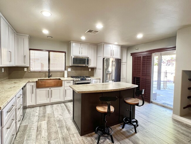 Building Photo - Stylish 3 Br 3 Ba Two Story Home w/Pool In...