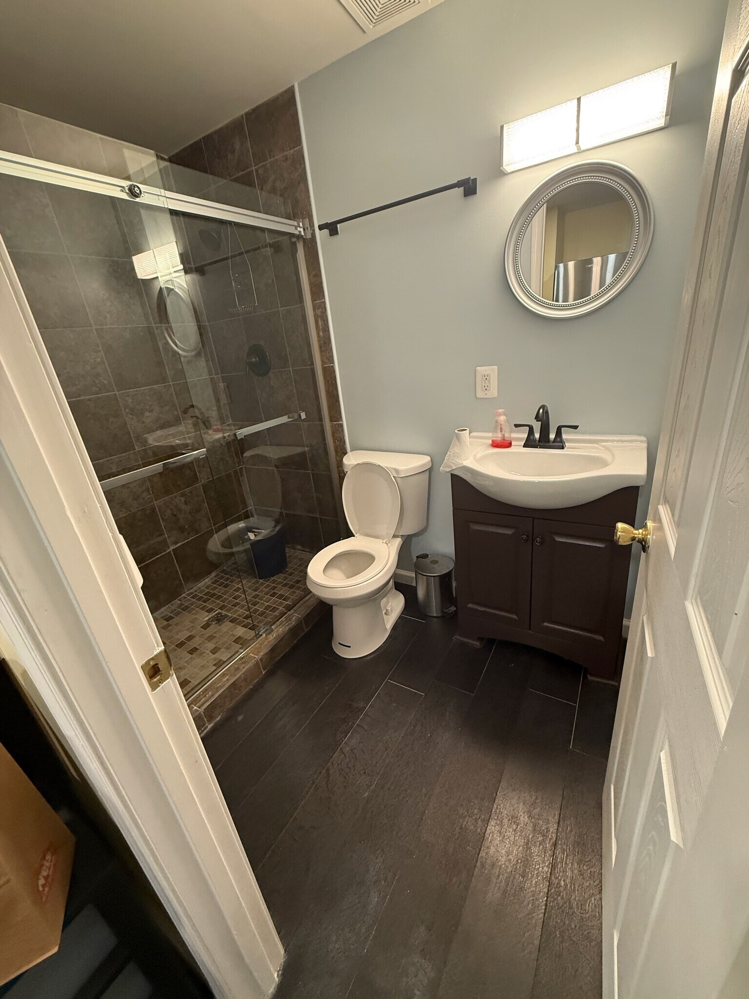 Clean, Modern Bathroom with Walk-In Shower Updated fixtures, strong water pressure, and easy mainten - 246 Arcadia Shores Cir