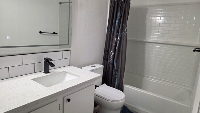 Building Photo - Beautifully remodeled pool home situated on a spacious quarter-acre lot