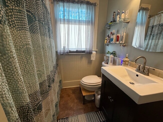 Building Photo - Stylish Hardwood Floors | Fenced Yard | 2-Car Garage | Prime Location