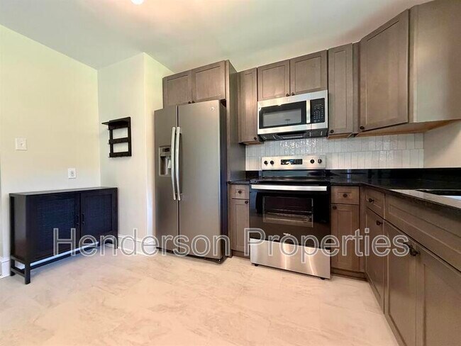 Building Photo - 6432 Woodland Cres
