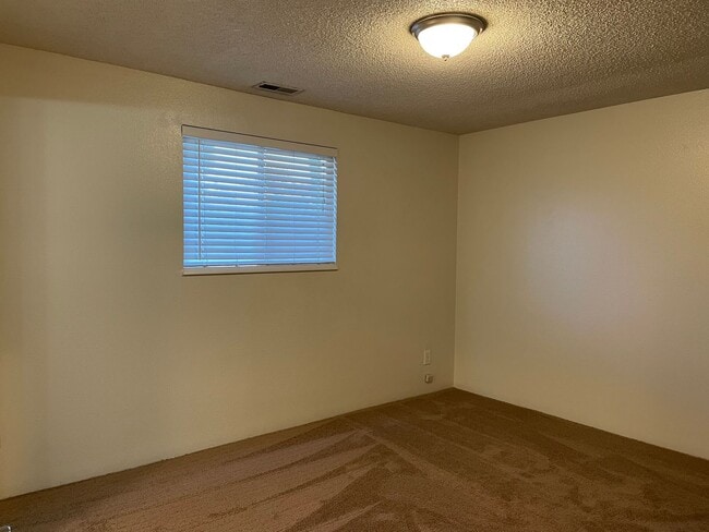 Building Photo - Nicely Tucked Away-3 Bed 2 Bath Home ~ New...