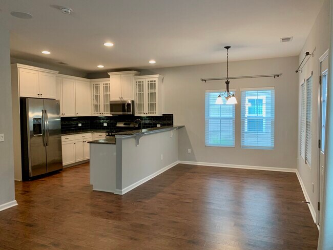 Dining area/bar with room for 4 barstools - 1545 Oldenburg Dr
