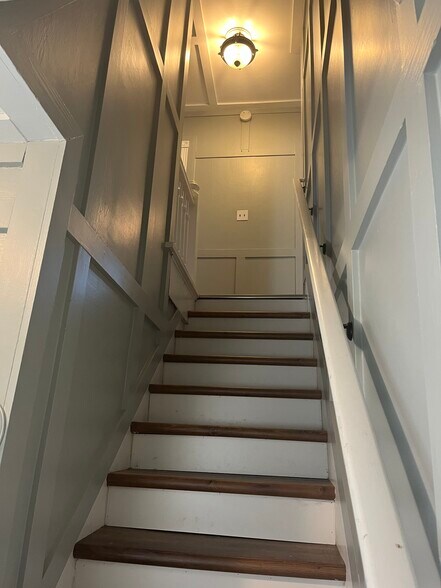 1st to 2nd floor steps, looking up from front door entrance - 715 Cattell St