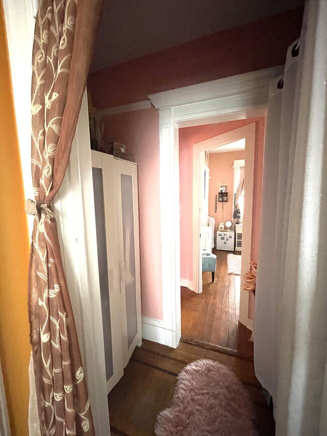 Long space between the master bedroom and living room can be use for extra storage space - 42 Central Ave