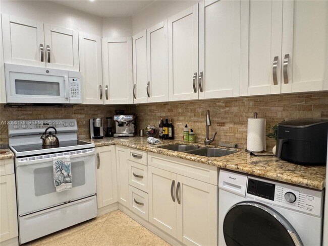 Building Photo - 10185 Collins Ave