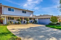 Building Photo - Executive Oasis l Huge Lot with Lush Green...