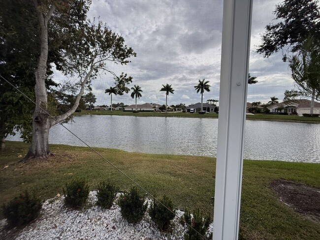 Building Photo - Luxurious 4 Bedroom 3 Bath Lakefront Pool Home W/3-Car Garage