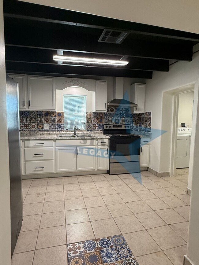 Building Photo - Charming Updated Home w/ Enclosed Yard & Storage