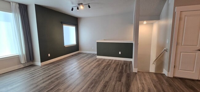Building Photo - Come check out this beautiful 3 story town...