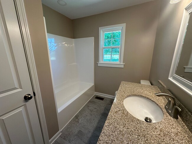 Building Photo - Newly Renovated Home in Shelbyville - 30 m...