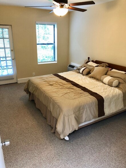 Master bedroom with walk-in closet and private balcony - 3719 12th St NE