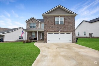 Building Photo - Pet Friendly Three Bedroom with Bonus!
