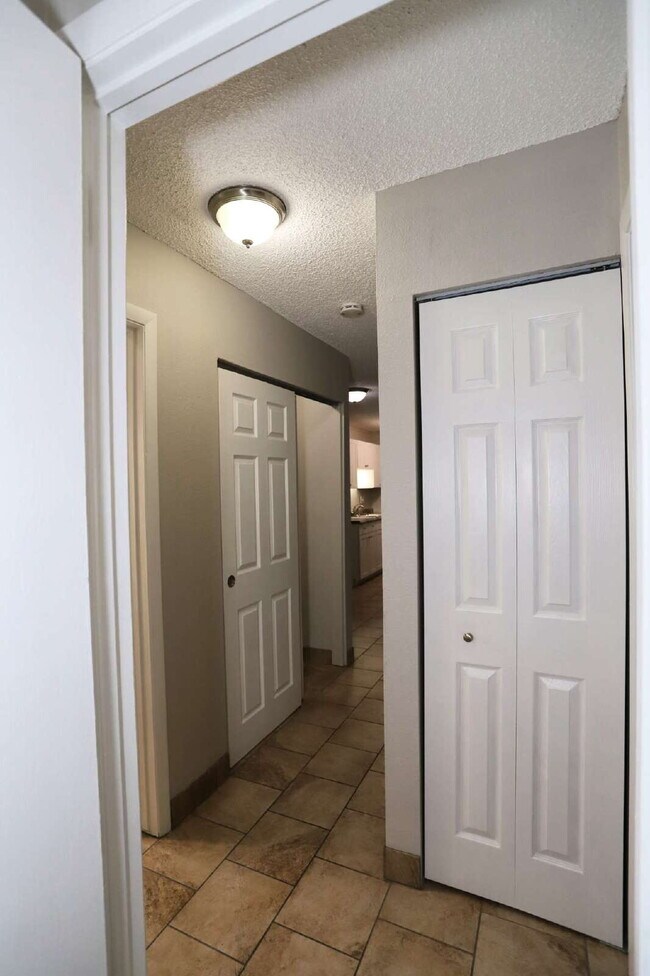 Building Photo - Updated & Clean 2BR Condo - Utilities Included - Laundry, Parking & Pool