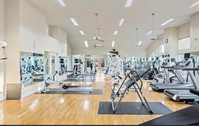 Building Photo - 1 bedroom plus loft features a functional floorplan with high ceilings